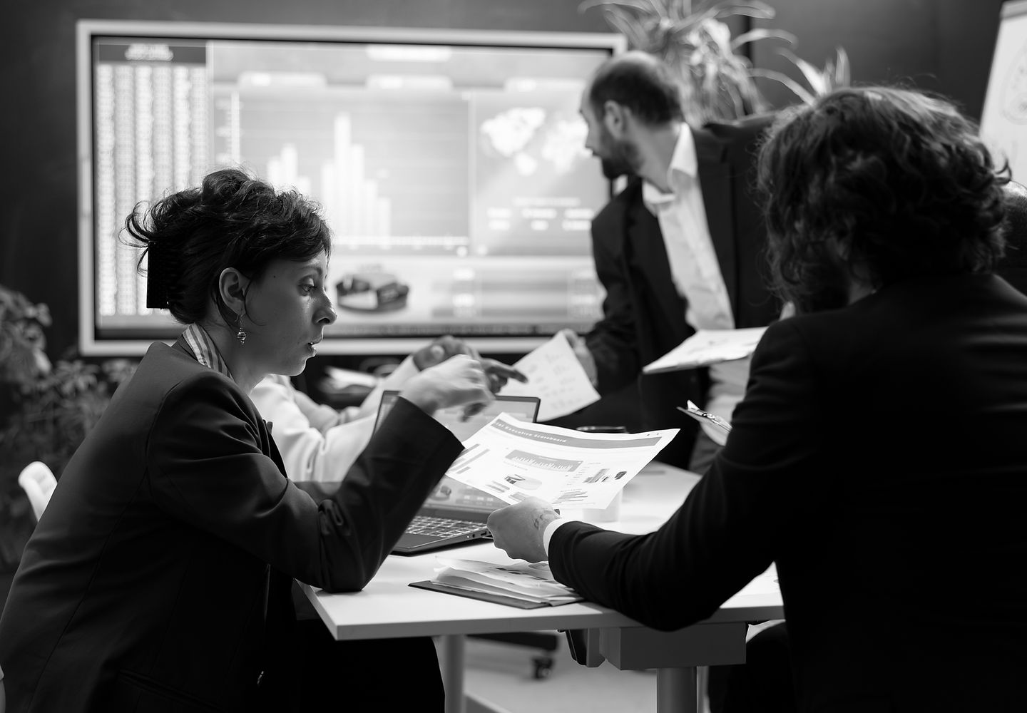 Business leaders reviewing IT challenges