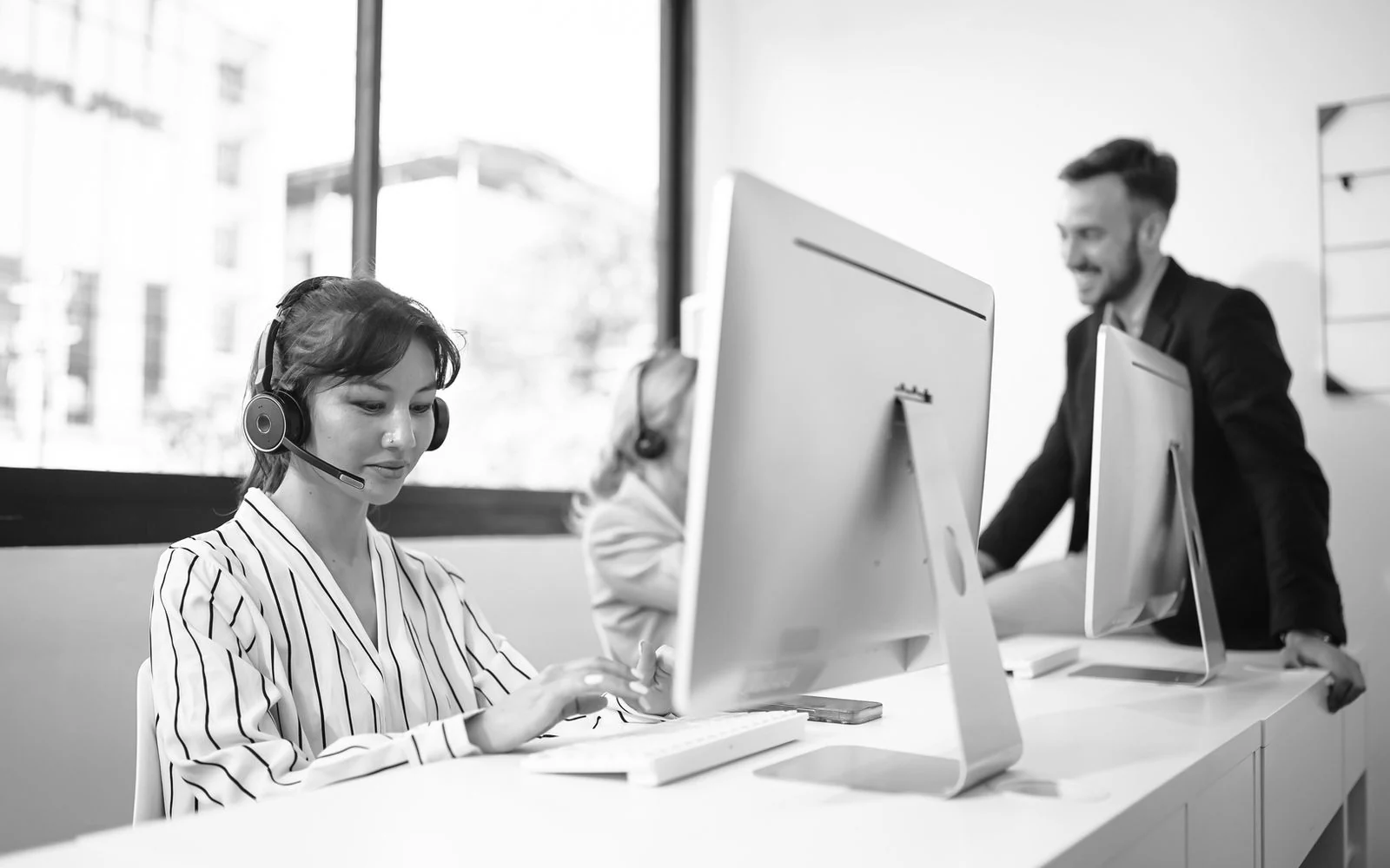 AIS Technology IT support specialist on a support call